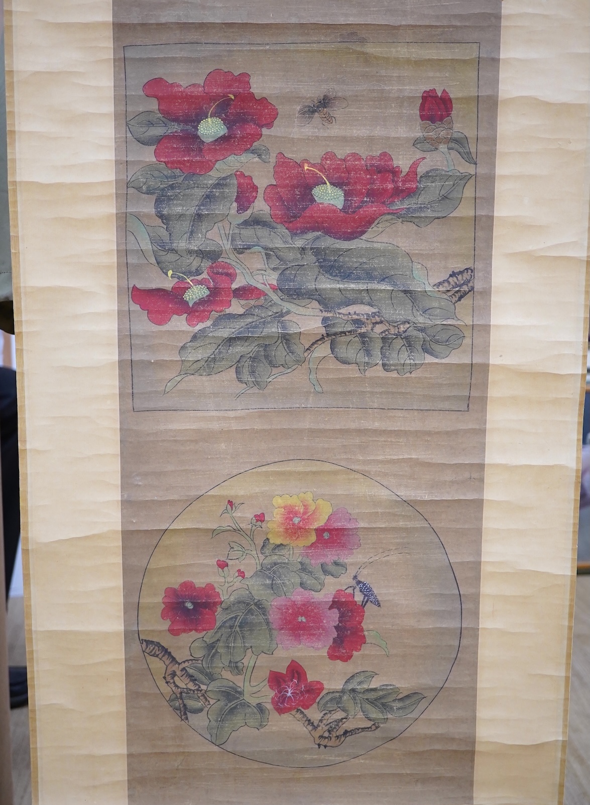 A pair of Chinese scroll pictures. Condition - fair